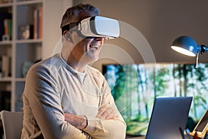 Man enjoying virtual reality at home