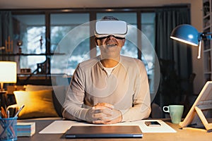 Man enjoying virtual reality at home