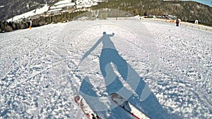 Man enjoys skiing in the Alps.