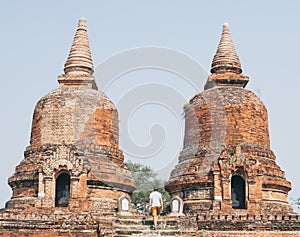 Man entering the ruins of old temple in Bagan, Myanmar