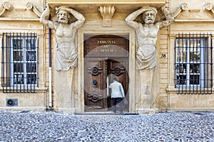 Man enters the commercial court in Aix en Provence photo