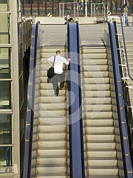 Man on escalator