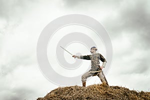 Man in ethnic suit in context of historical reconstruction