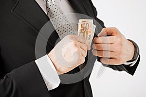 Man with euro cash money