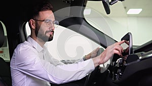 A man examine vehicle before making purchase. Buy car