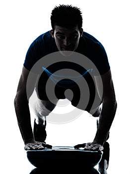 Man exercising bosu push ups workout fitness posture silhouette