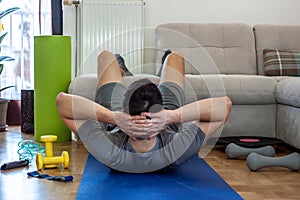 Man exercising doing workout at home