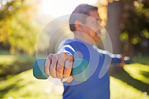 Man exercising with dumbbell