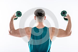 Man exercising with dumbbells