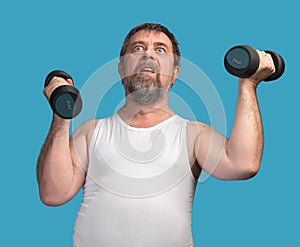 Man exercising with dumbbells