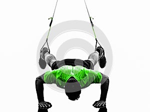 Man exercising suspension training trx silhouette