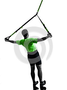 Man exercising suspension training trx silhouette