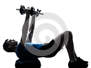 Man exercising weight training workout fitness