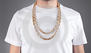 Man with a expensive necklace. Fashion accessories and jewelry