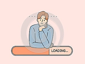 Man is experiencing problems due to poor internet networks and relies on loading line.