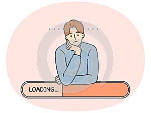 Man is experiencing problems due to poor internet networks and relies on loading line.