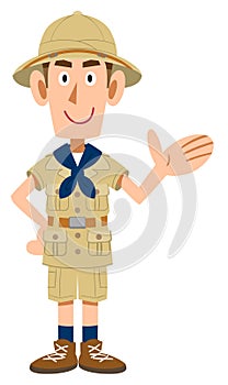 Man in explorer\'s clothes guiding with palm