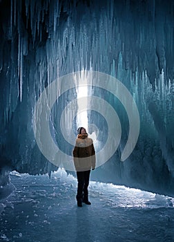 Man exploring ice cave