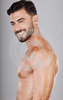 Man, face or body muscles on studio background in workout check, healthcare wellness or training goals. Smile, happy, or