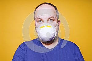 Man with face mask and panic in his eyes