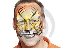 Man with face painting tiger