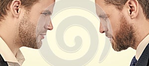 Man face portrait, banner with copy space. two businessmen starring to each other in business conflict, misunderstanding