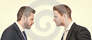 Man face portrait, banner with copy space. two businessmen starring to each other in business conflict, opposition.