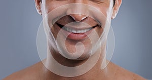 Man, face and smile with skincare and lips with hygiene, jawline and satisfaction with treatment closeup. Grooming