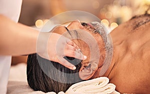 Man, facial and head massage at spa for break, skincare therapy and holistic healing at cosmetics salon. Face, peace or