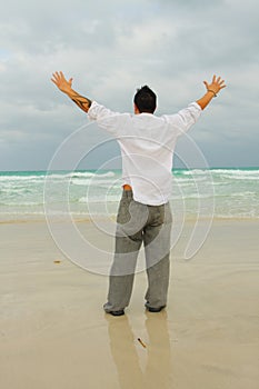 Man Facing The Ocean