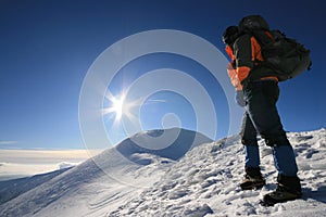 Man facing the sun