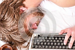 Man fall asleep. Writer used old fashioned typewriter. Author tousled hair fall asleep while write book. Workaholic fall