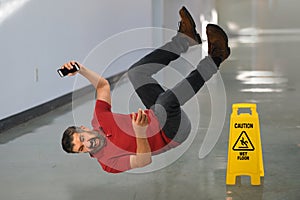 Man Falling on Floor