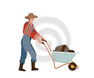 Man farmer carries wheelbarrow full of dirt manure or ground. Gardener wearing in jumpsuit, shirt in a cage work with