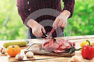 Man farmer cooking beef meat for cooking healthy food