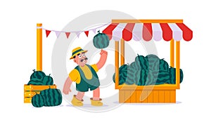 Man farmer sells watermelons at outdoor market stall