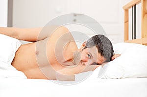 Man in feather bed - the awakening