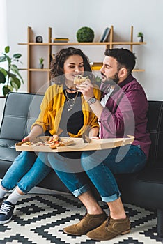 Man feeding his girlfriend