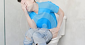 Man feel pain with constipation photo