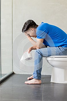 Man feel pain with constipation photo