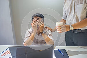 The man feeling tired and frustrated at workplace