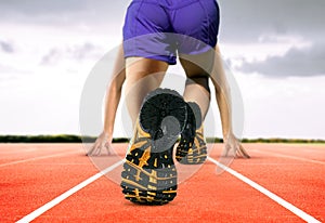 Man Feet on Running Track