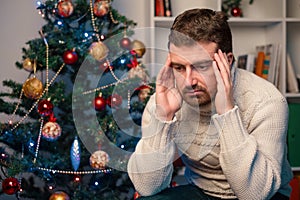 Man felling depressed and lonely during the christmas time