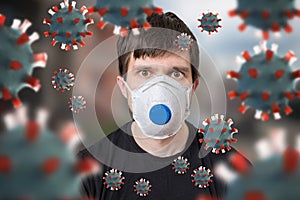 Man with FFP3 respirator face mask. Many viruses around.