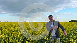 Man in field of dandelions brilliant nature looking at camera Brilliant nature's display vibrant yellow blooms