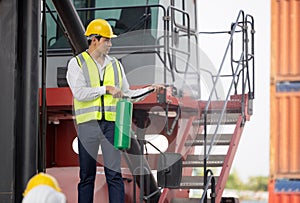 Man with a fire extinguisher training team workers