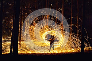 Man and fire orb photo