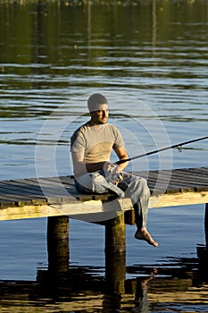 Man fishing on a dock