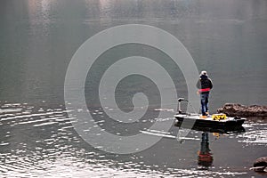 Man Fishing Lake.