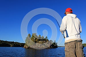 Man Fishing Large Mouth Bass